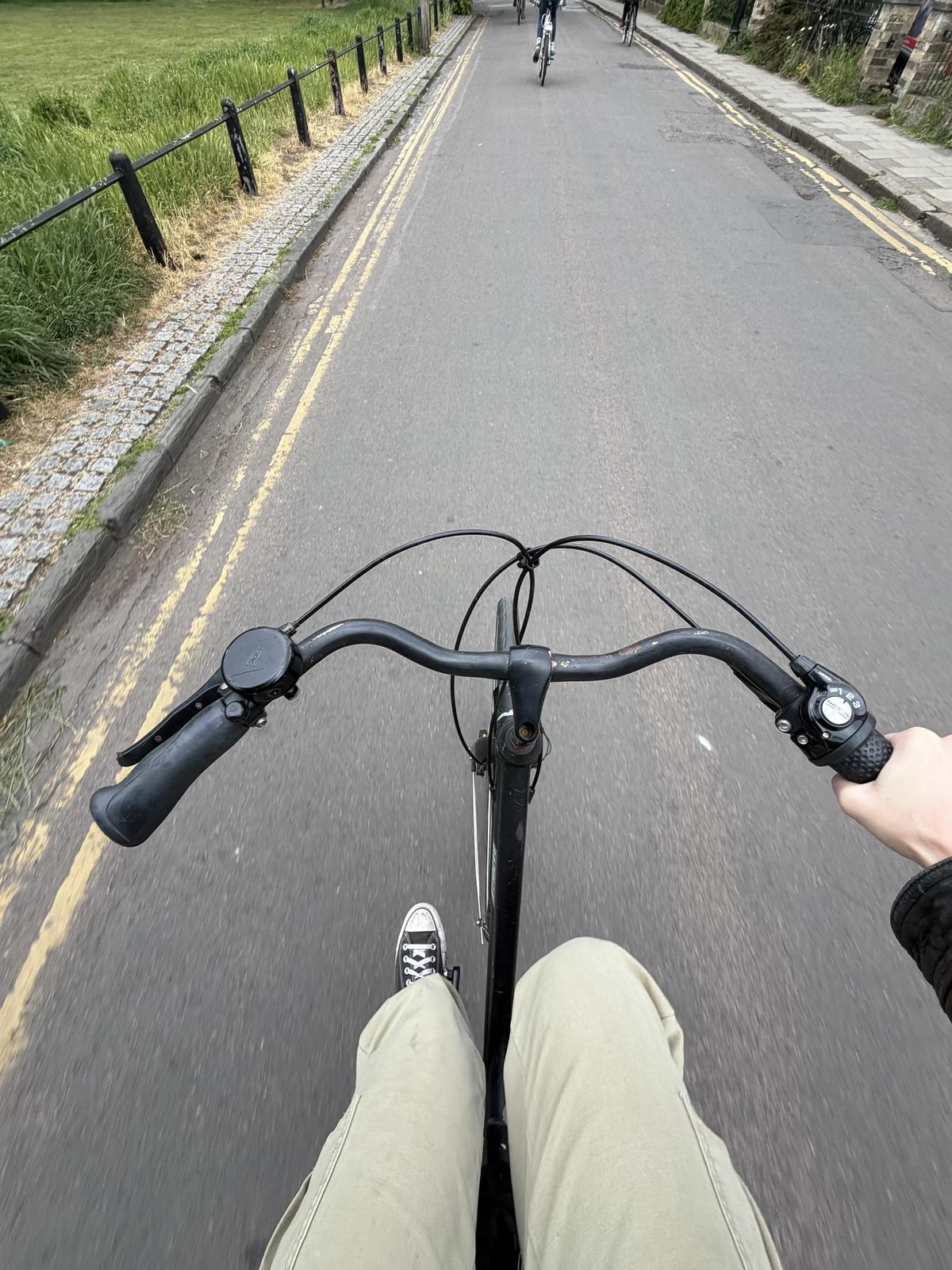 Cycling in Cambridge: Note the two yellow lines to the left. 